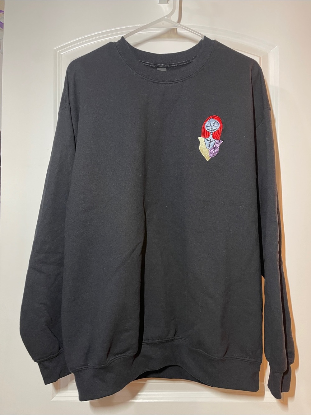 Gildan Black Crewneck Sweatshirt with Red-Accented Embroidered Patch